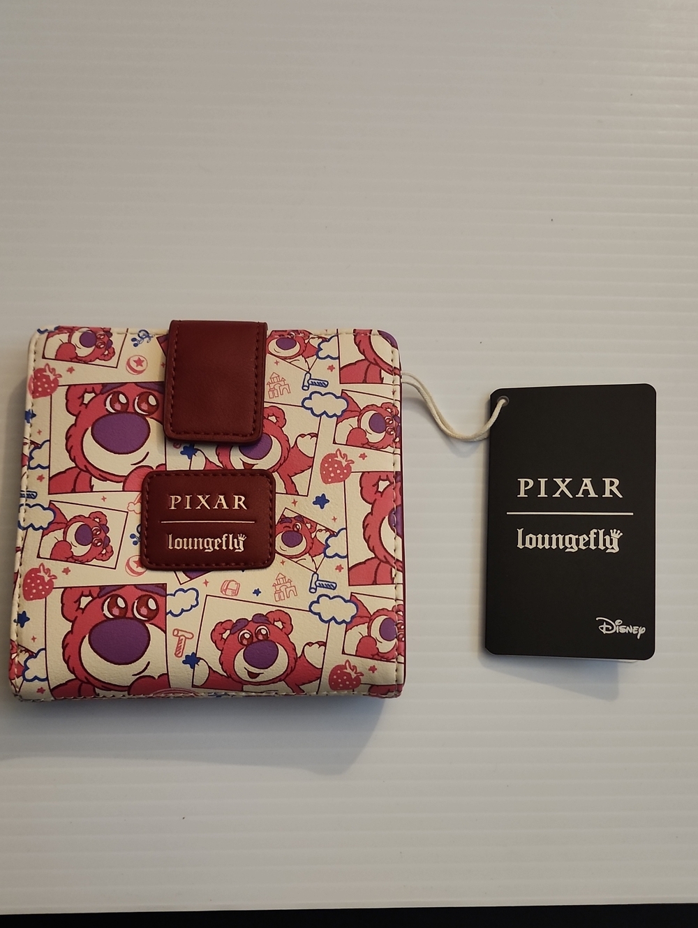 Loungefly Pixar Lotso All-Over-Print Snap Wallet. NWT. 5×5